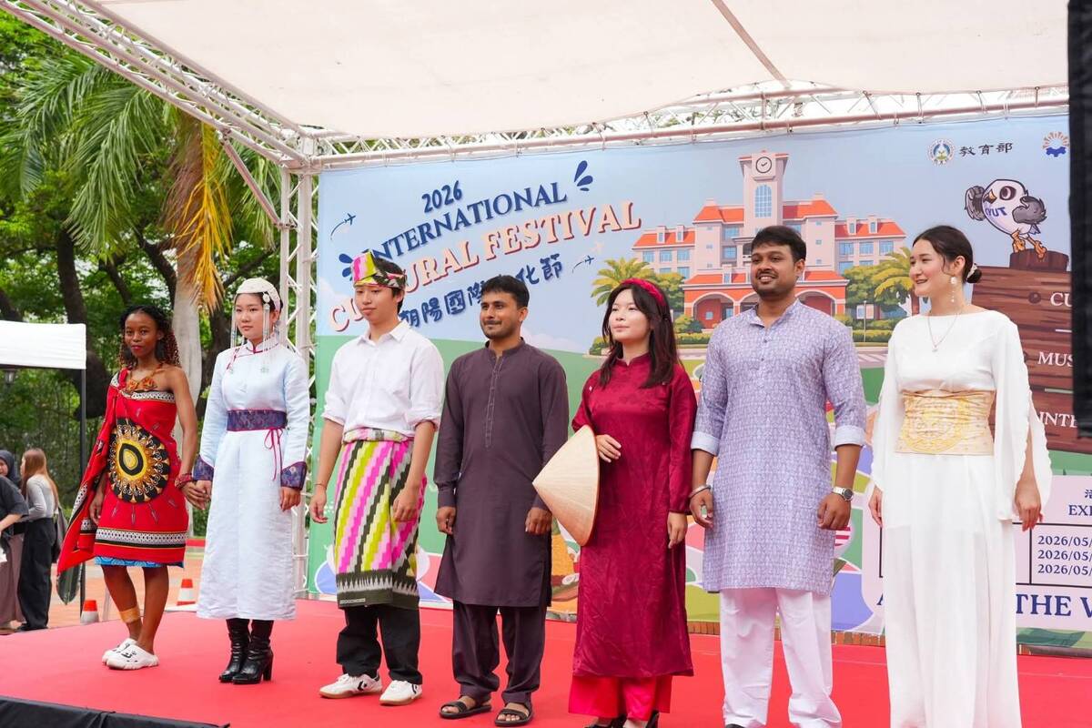 Students from Eswatini, Mongolia, Indonesia, Pakistan, Vietnam, India, and Kyrgyzstan showcase traditional attire in a cultural fashion show.Image