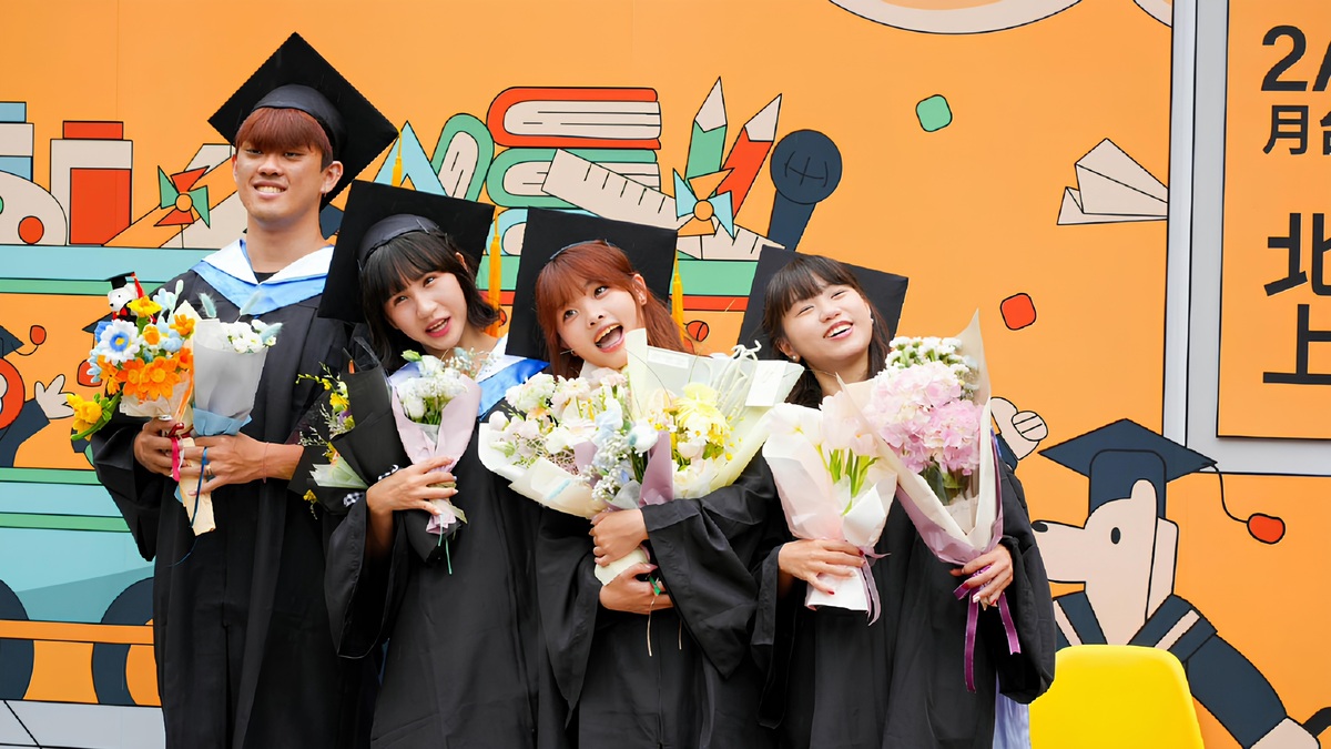 Graduates pose for photos, capturing lasting memories of campus life.Image